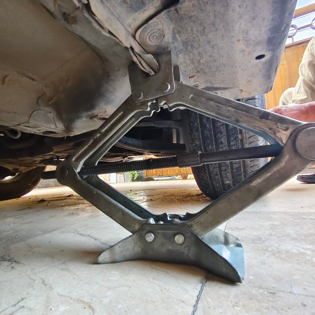 Jack in placement under car